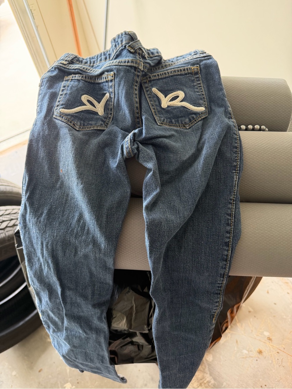 Rocawear Men's Relaxed Blue Denim Jeans with Embroidered Back Pockets